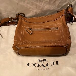 Pre-owned crossbody purse; super soft leather. Ballpoint pen marks visible.
